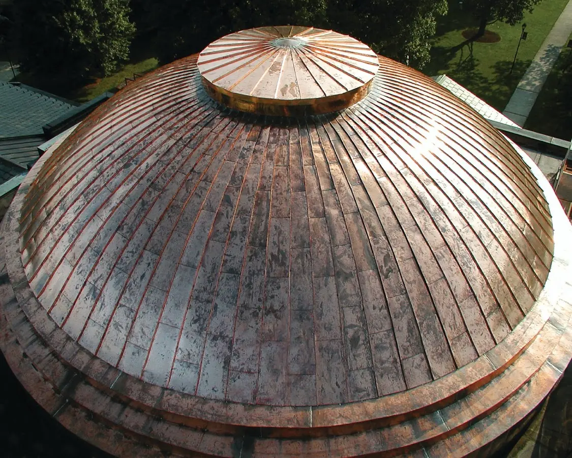 Craftsman Roofing crew installing a new roof in Elmwood